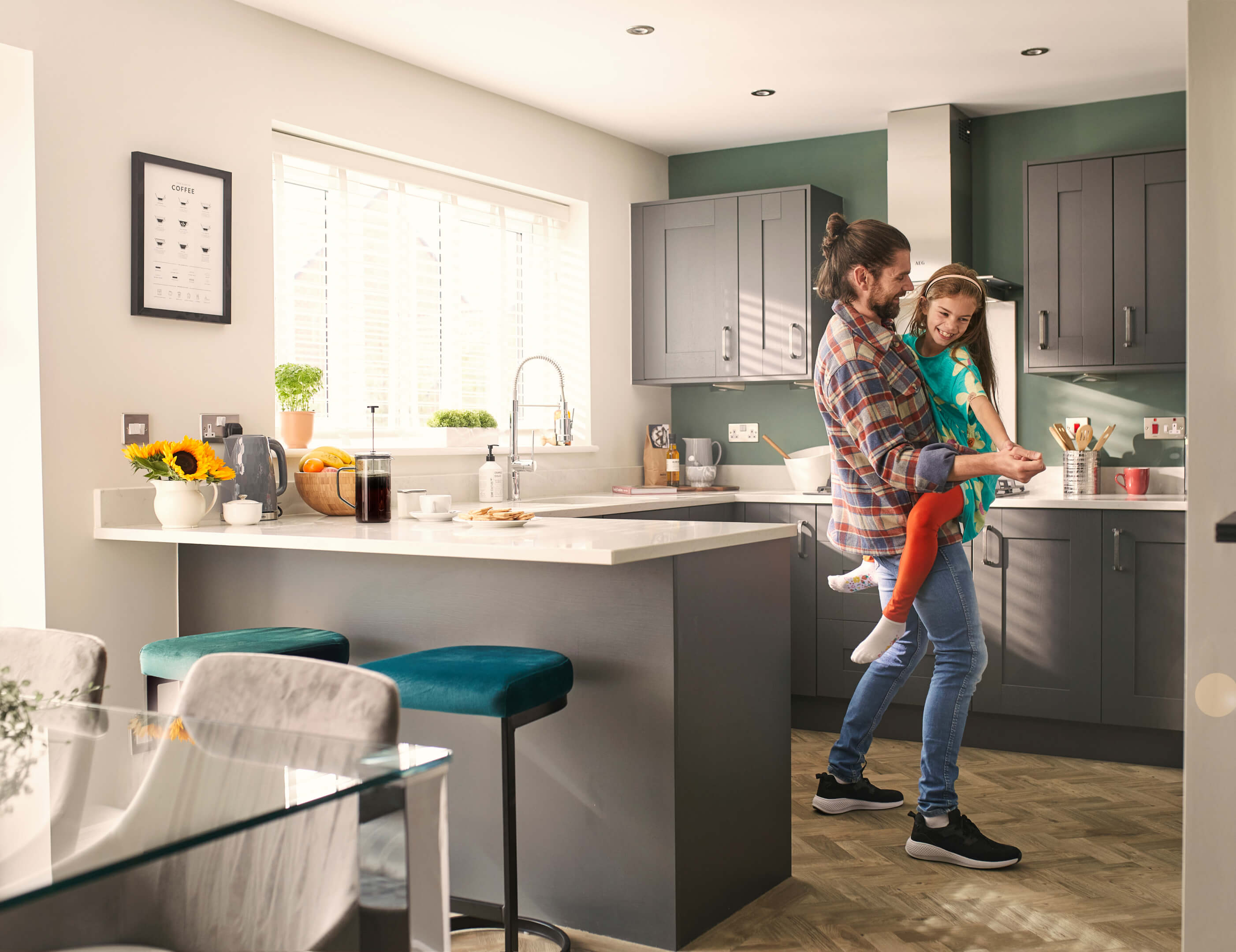 Father and daughter in kitchen